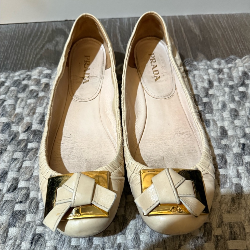 Prada Women's Cream Loafers with Gold Detail